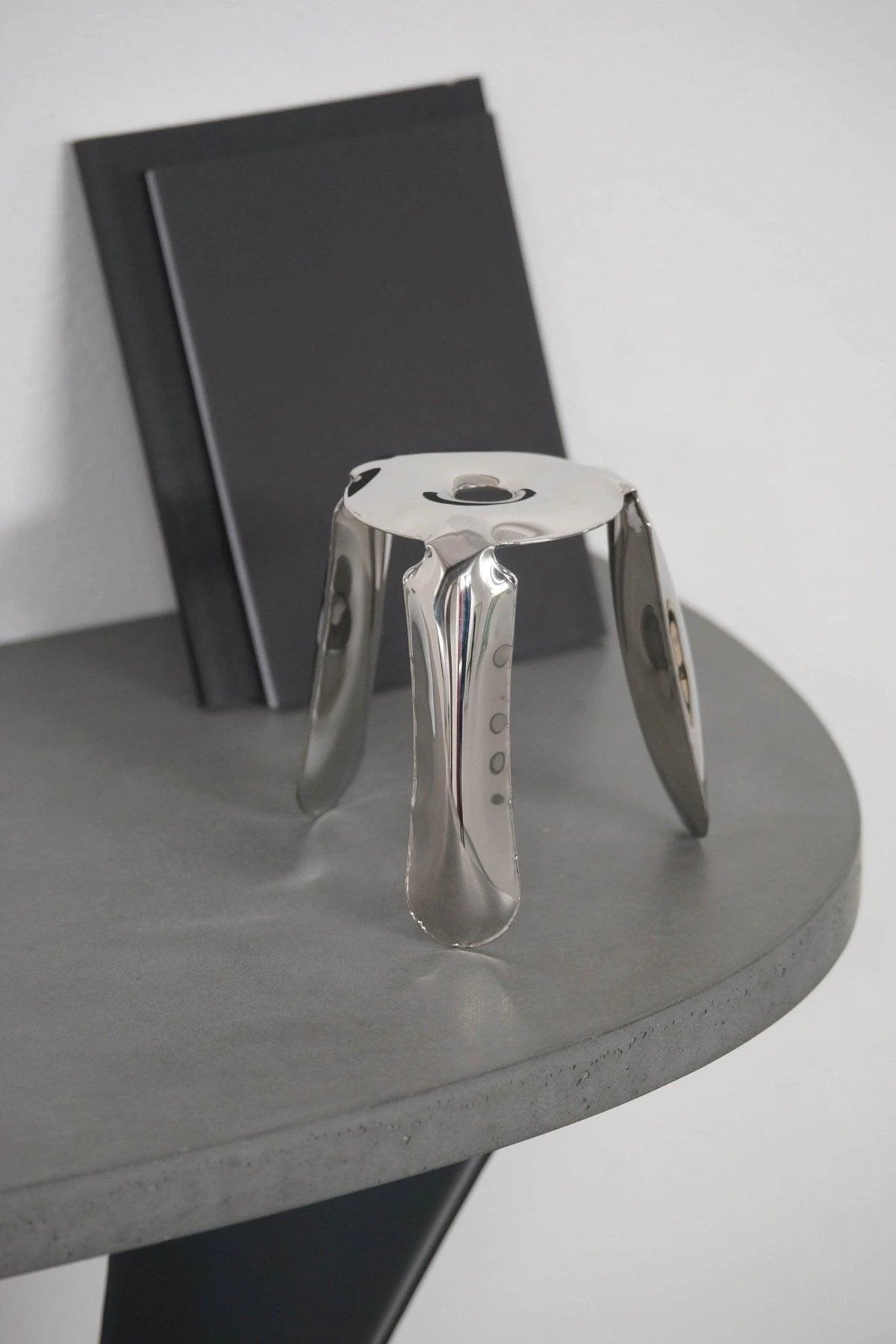 Drop Stool — Sculptural Mirror-Polished Steel Stool (Hand-Finished)